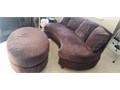 Brown Curved Sofa With detachable Ottoman Very Good Condition approximately 66 long  150 or Bes
